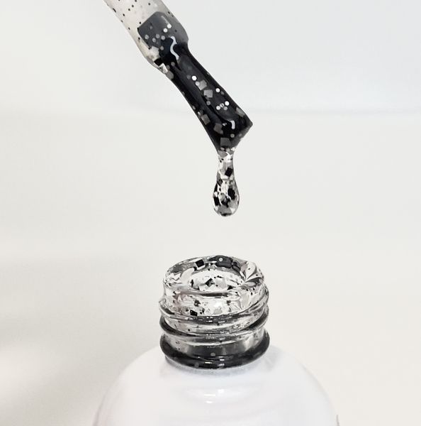 Топове покриття для гель лаку UNO Top Monochrome Shine з чорними та срібними пластівцями без липкого шару 12 мл 007228 фото